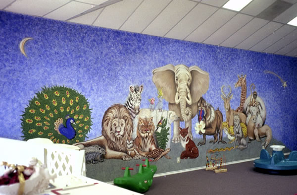 Mural of animals painted in a playroom